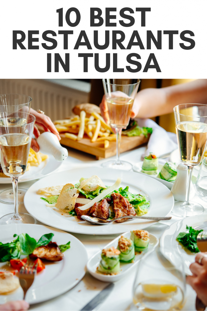 pin showing the title 10 best restaurants in Tulsa with image of food on restaurant table below. 